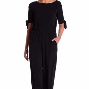 NWT black Vince Camuto jumpsuit size M